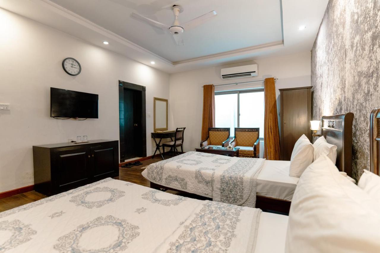 Vip House Hotel Peshawar Bagian luar foto